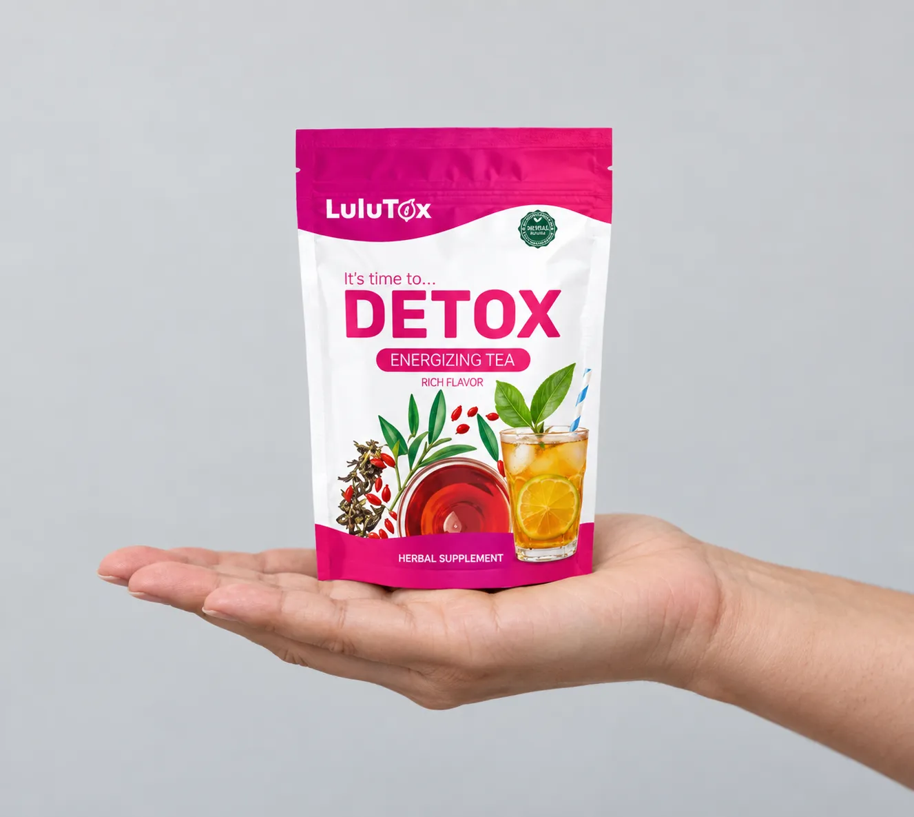 Lulutox Detox Tea — the package held in a hand